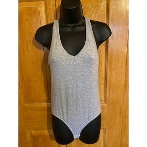 Gray tank bodysuit.